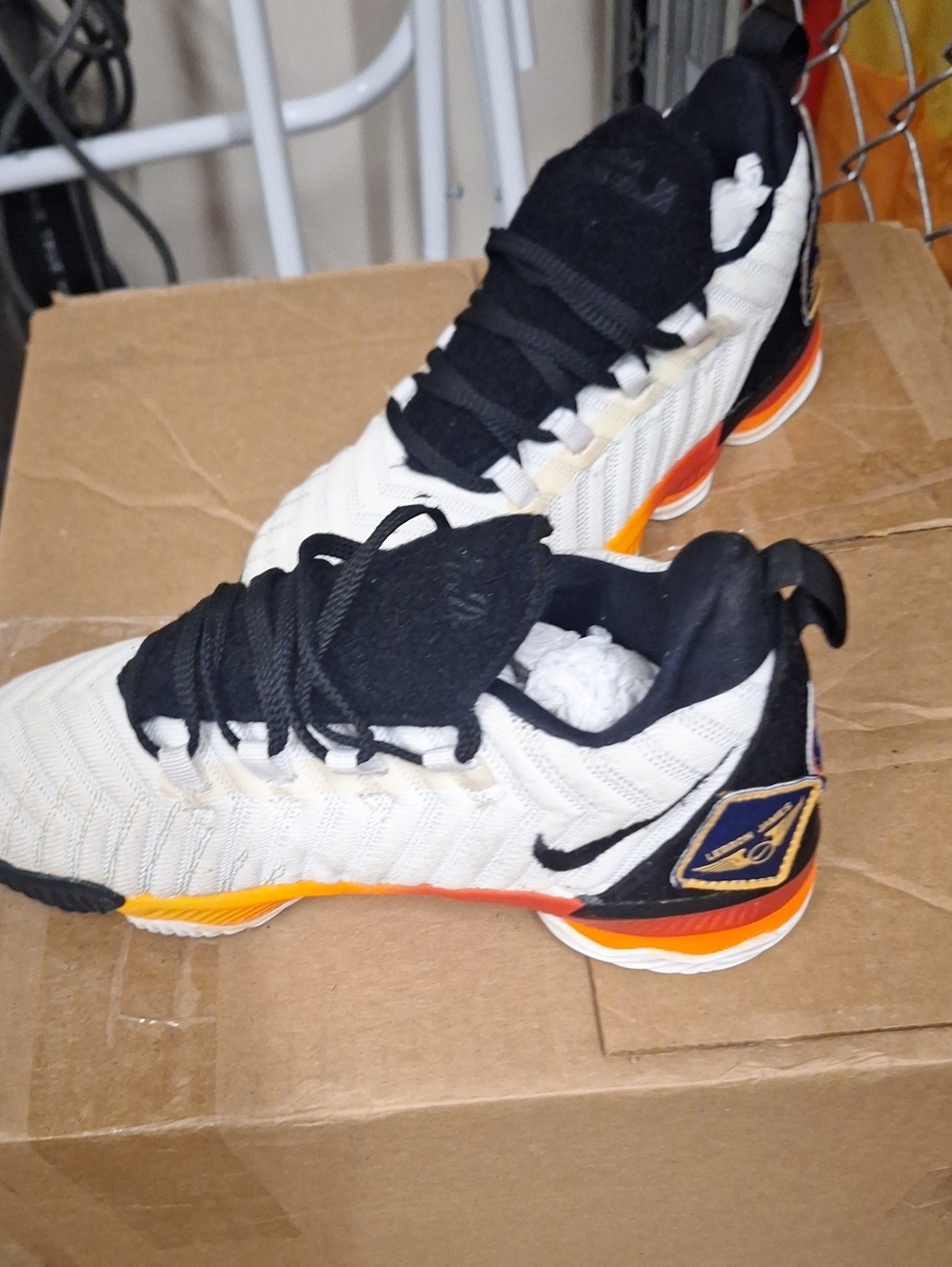 Kids White and Black Athletic Sneakers with Orange Accent - Brand Unknown